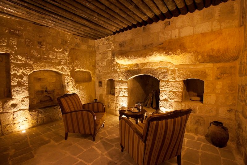 Kuşçular Konağı Öncesi Ve Sonrası, Kayakapi Premium Caves - Cappadocia Kayakapi Premium Caves - Cappadocia Rustic style living room