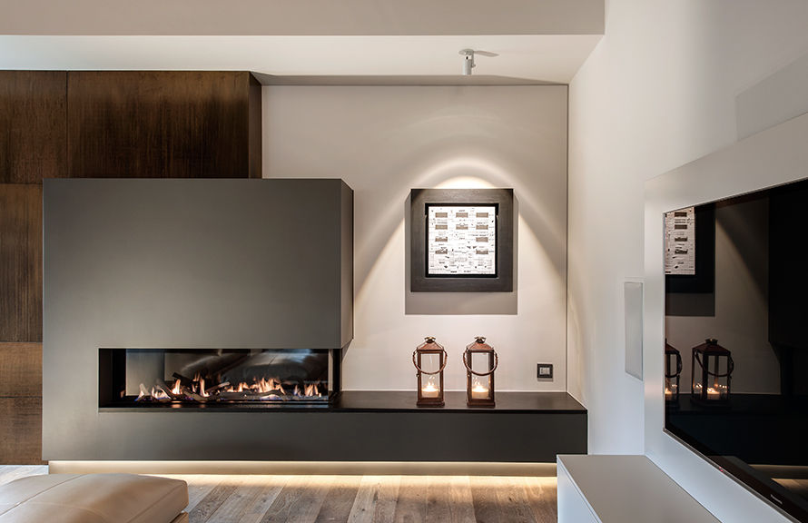 Attico mansardato, BRANDO concept BRANDO concept غرفة المعيشة ديكورات مدفأة الحطب
