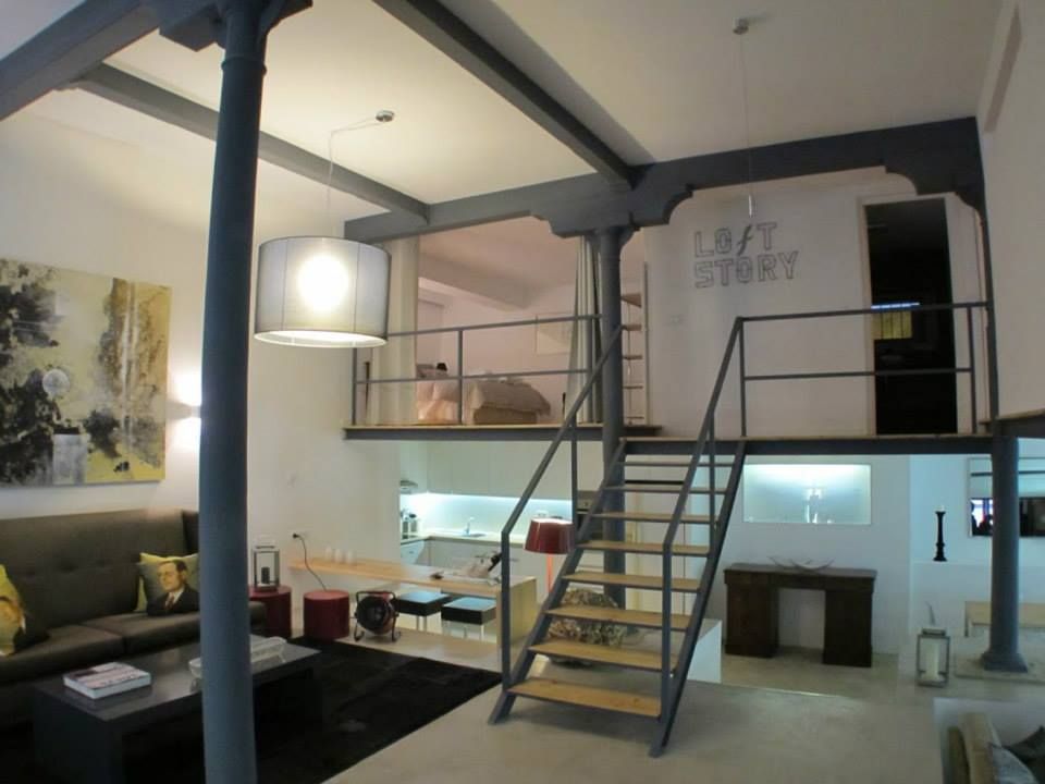 Loft Story, DRCF Arquitectos DRCF Arquitectos Вітальня