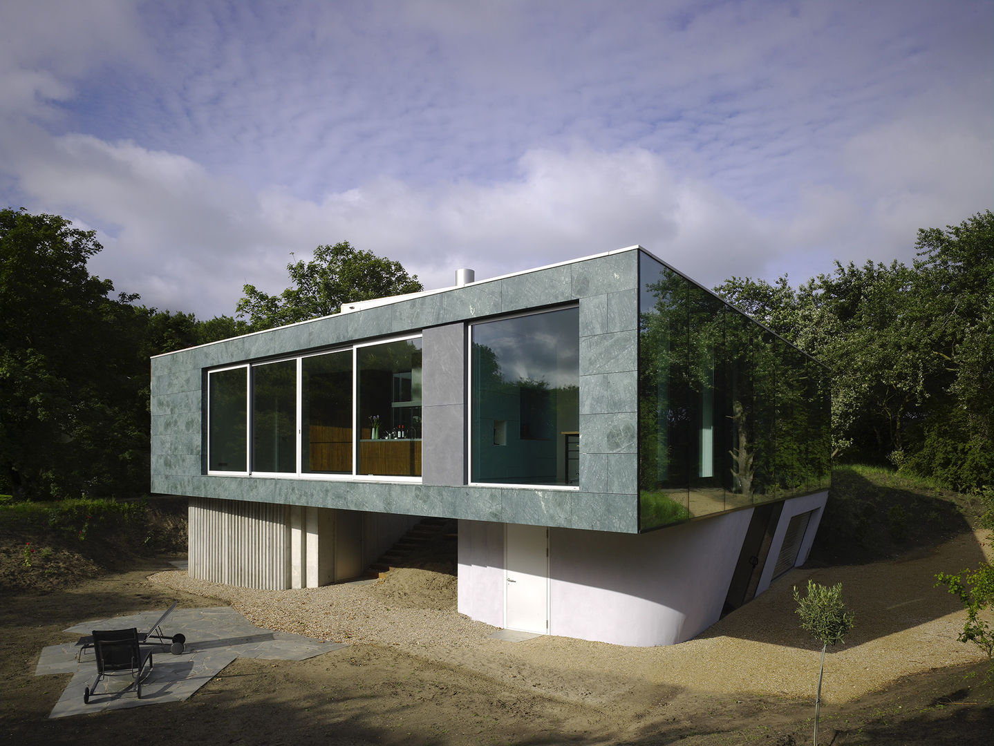 Villa in de duinen, Hoek van Holland, De Zwarte Hond De Zwarte Hond Casas modernas: Ideas, imágenes y decoración Piedra