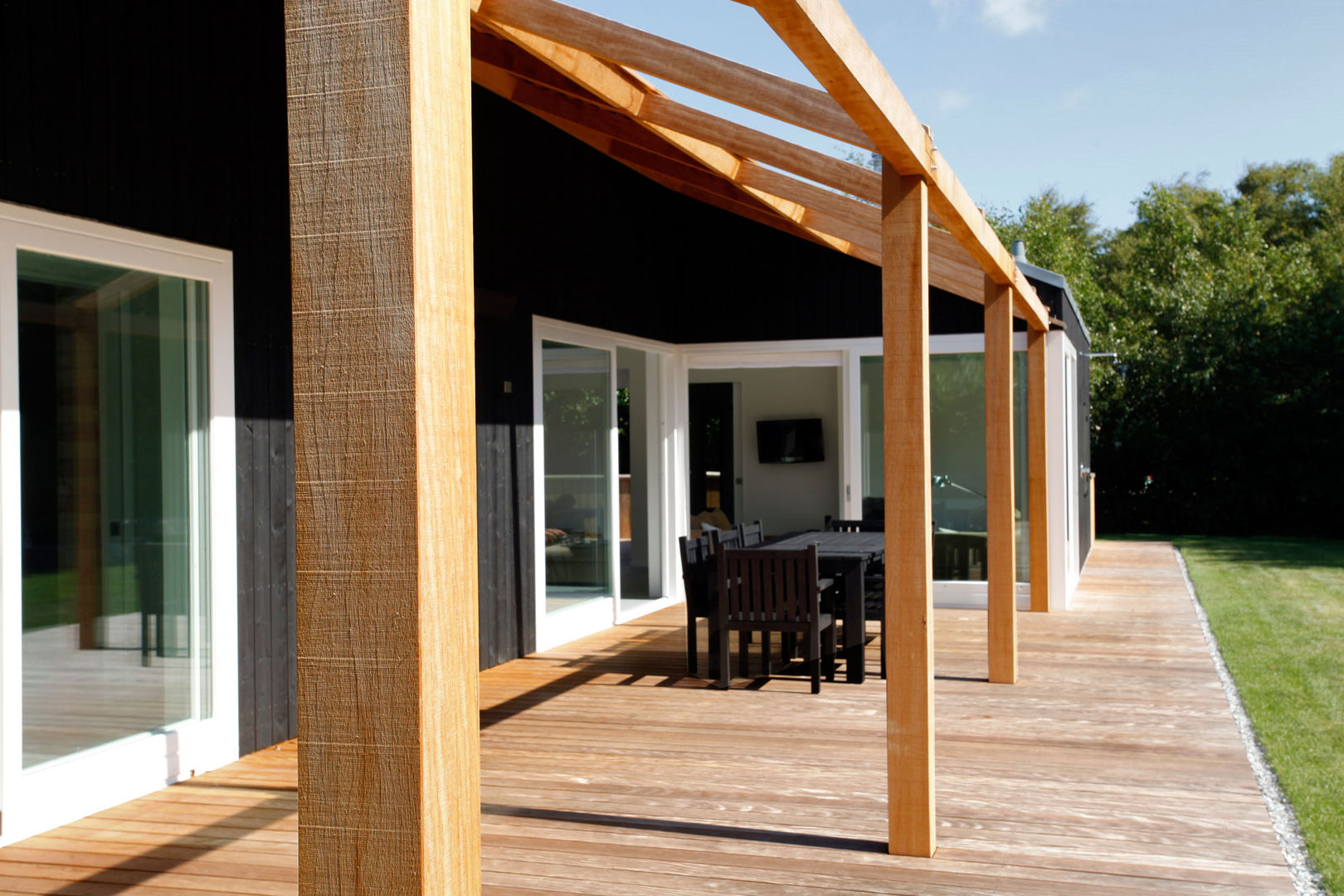 Vakantiewoning Cornelisse, Schiermonnikoog, De Zwarte Hond De Zwarte Hond Scandinavian style balcony, veranda & terrace Wood Wood effect