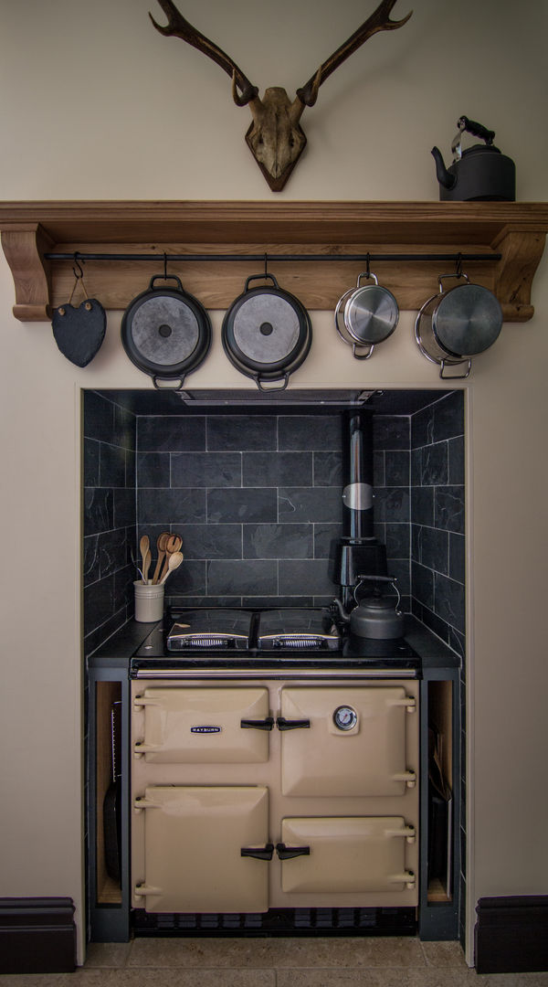 Cotswold Chapel Kitchen homify Cocinas de estilo rural Madera maciza Multicolor rayburn,slate,slate splashback,oak shelf,hanging rail,rayburn range cooker