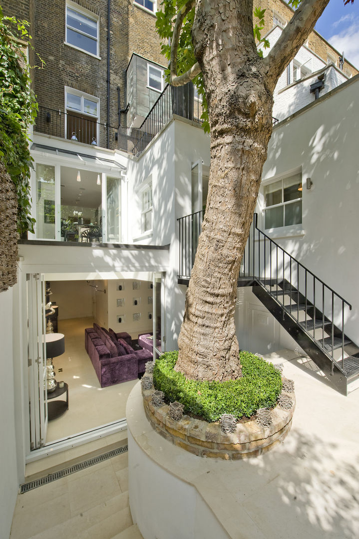 Garden area at Chester Street House Nash Baker Architects Ltd สวน