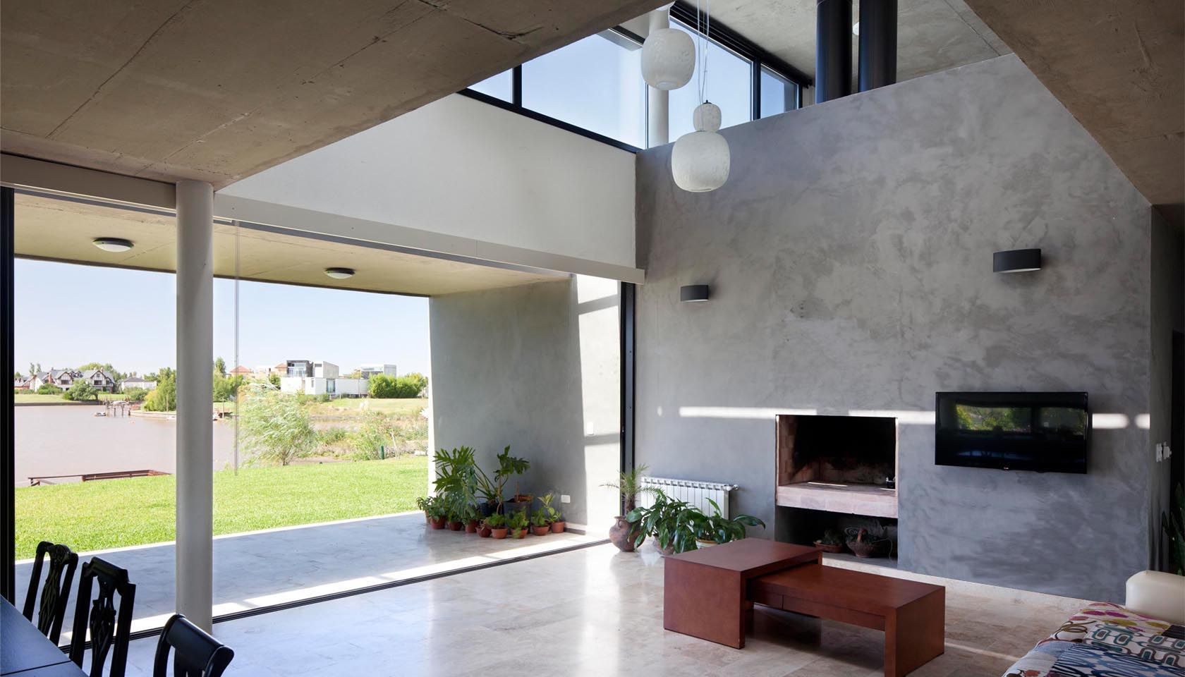 Casa JG, Speziale Linares arquitectos Speziale Linares arquitectos モダンデザインの リビング