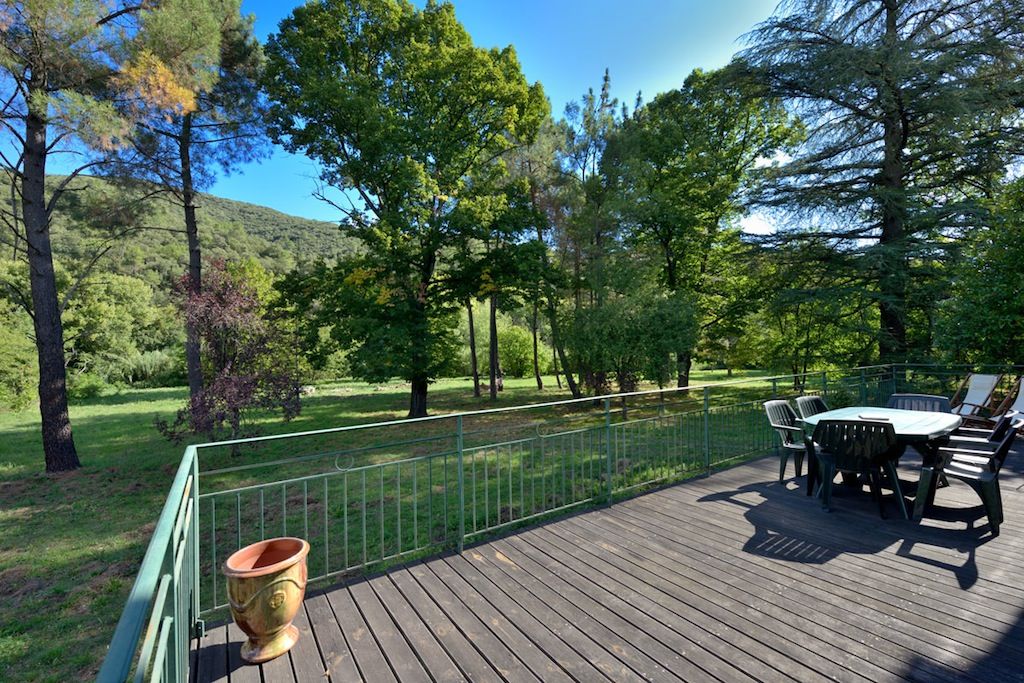 RÉNOVATION D'UNE MAISON CÉVENOLE, JOSE MARCOS ARCHITECTEUR JOSE MARCOS ARCHITECTEUR Country style balcony, porch & terrace Wood Wood effect