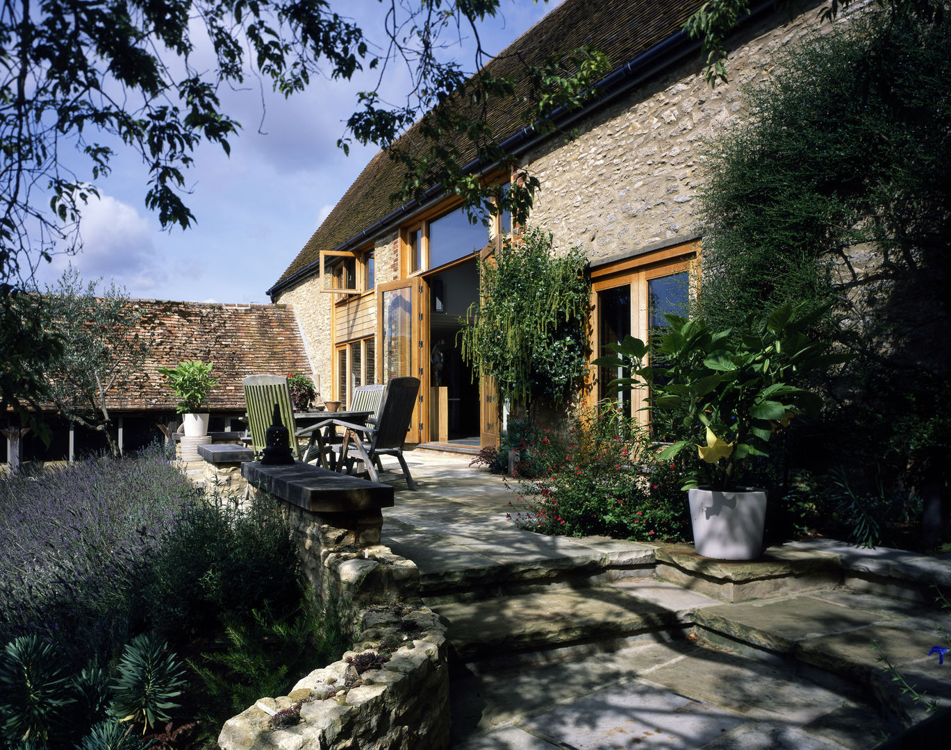 KSR Architects | Luxury barn conversion | Terrace homify Varandas, marquises e terraços rústicos Pedra