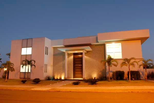 Residência - Cond. Alphaville Araguaia, Sandra Kátia Junqueira Sandra Kátia Junqueira Modern houses