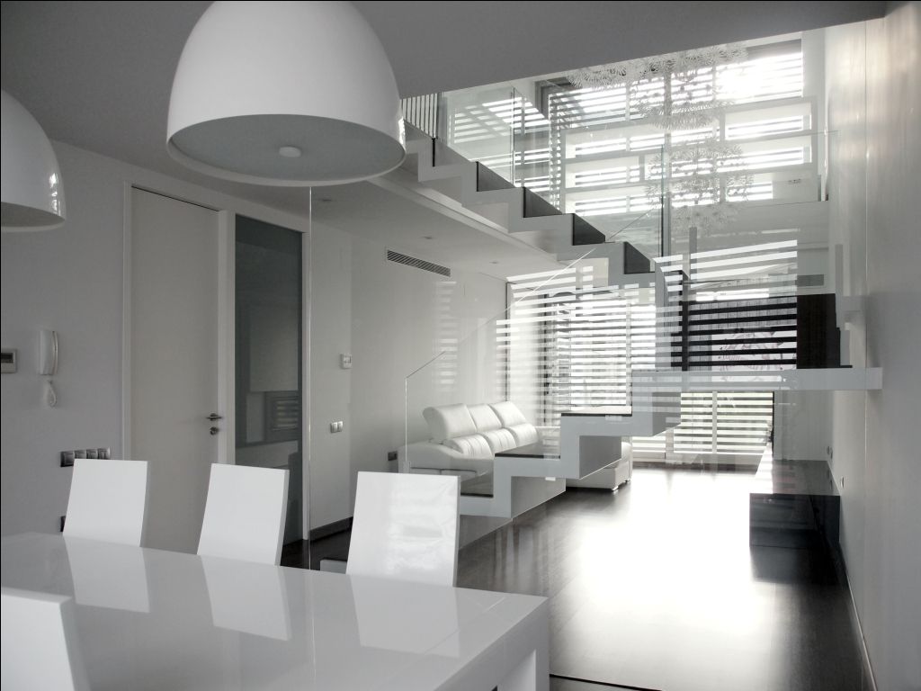 vivienda unifamiliar estilo moderno Cota-Zero, Técnica y Construcción Integrada, S.L. Salones de estilo moderno