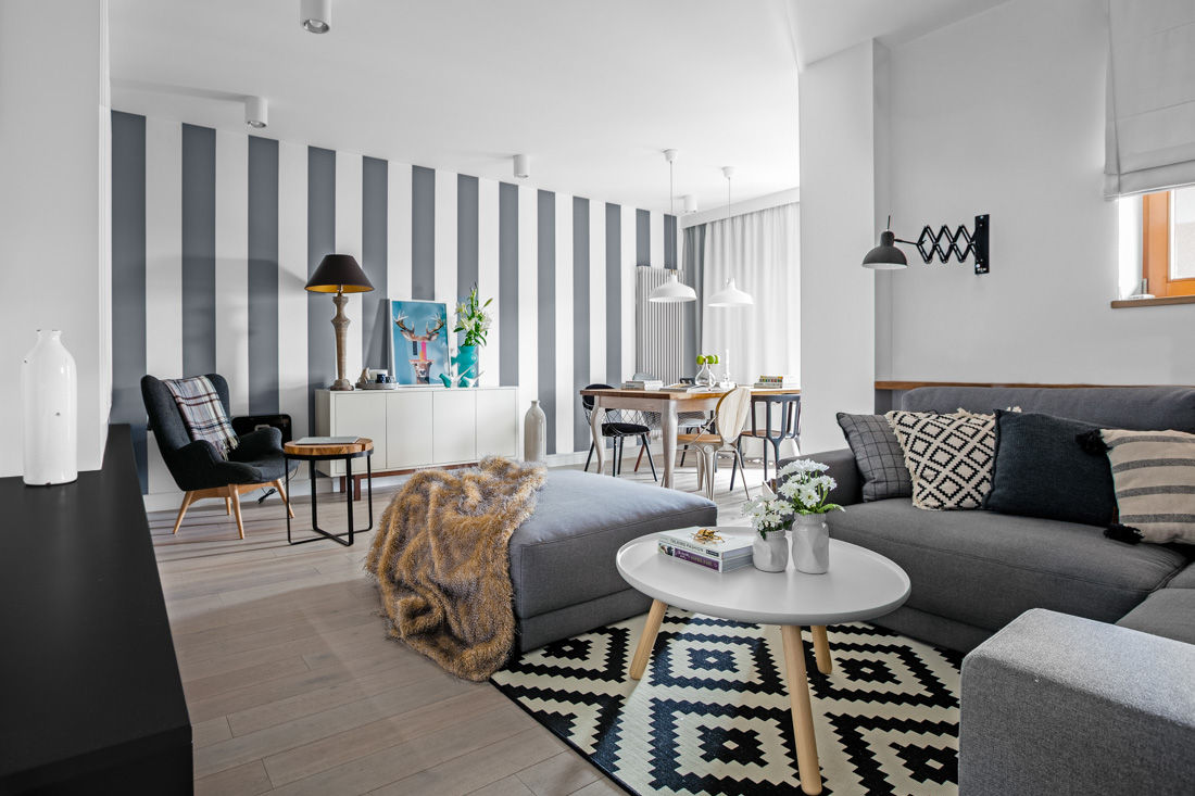 Our photoshoot of apartment design by Domaga Architects homify Eklektyczny salon Futro Biały