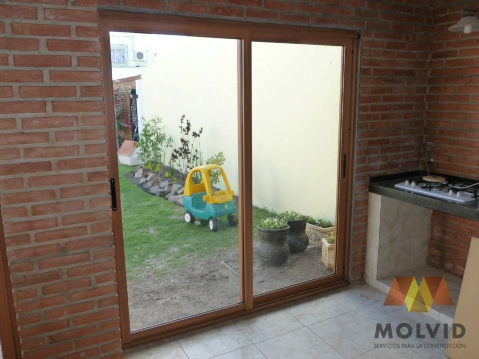 Obra Quincho Merlo Norte, VETROLUX ABERTURAS VETROLUX ABERTURAS Puertas y ventanas de estilo moderno