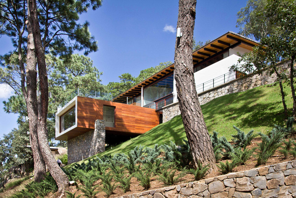 La casa en el bosque, EMA Espacio Multicultural de Arquitectura EMA Espacio Multicultural de Arquitectura Casas modernas