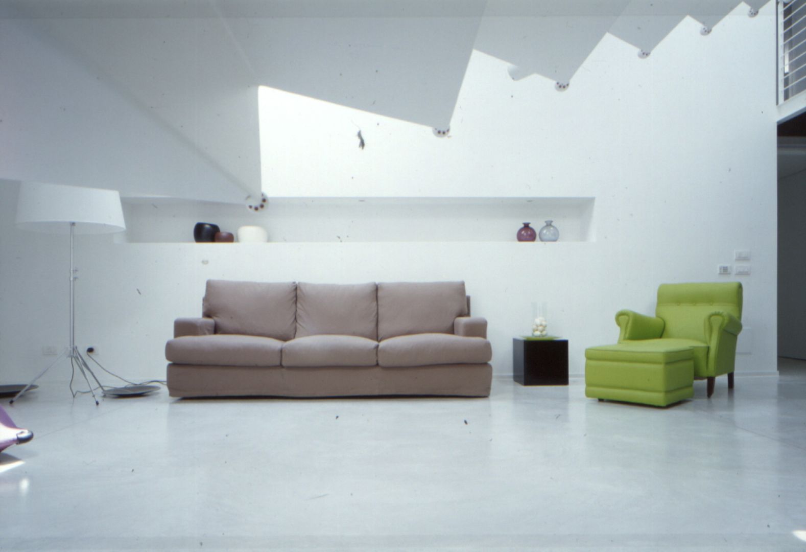 Una mansarda a Mantova, Benedini & Partners Benedini & Partners Living room