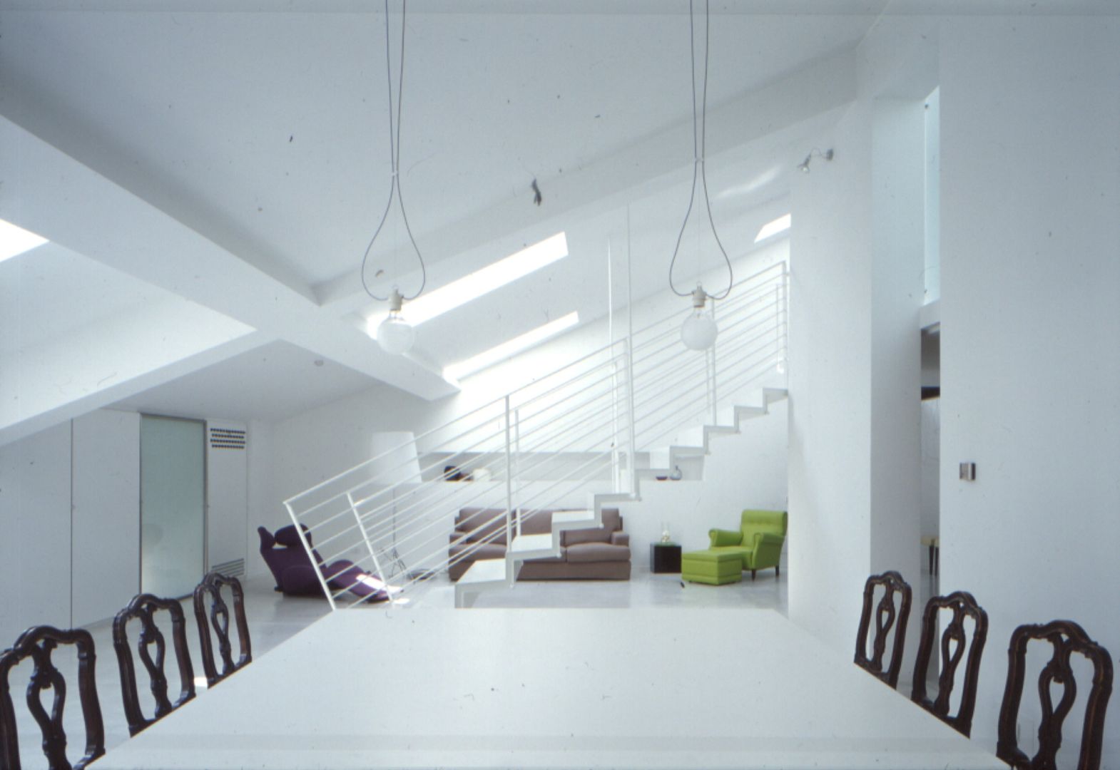 Una mansarda a Mantova, Benedini & Partners Benedini & Partners Minimalist living room