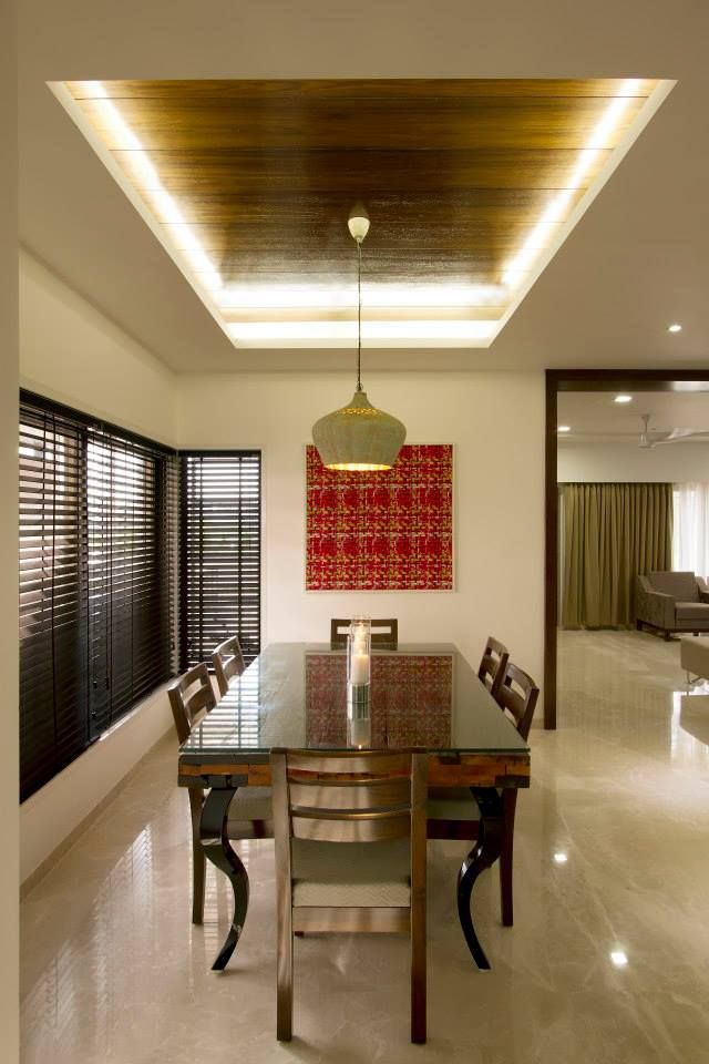 Sandeep Gandhi Bungalow, P & D Associates P & D Associates Modern dining room