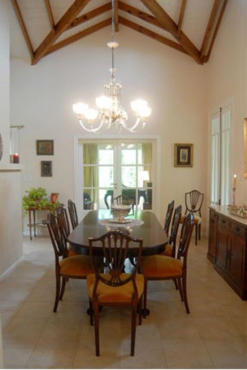 Comedor Radrizzani Rioja Arquitectos Phòng ăn phong cách chiết trung Bê tông classic,chandelier ceiling,dining table