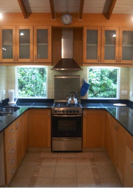 Cocina Radrizzani Rioja Arquitectos Ausgefallene Küchen Holz Holznachbildung kitchen wood,storage,windows