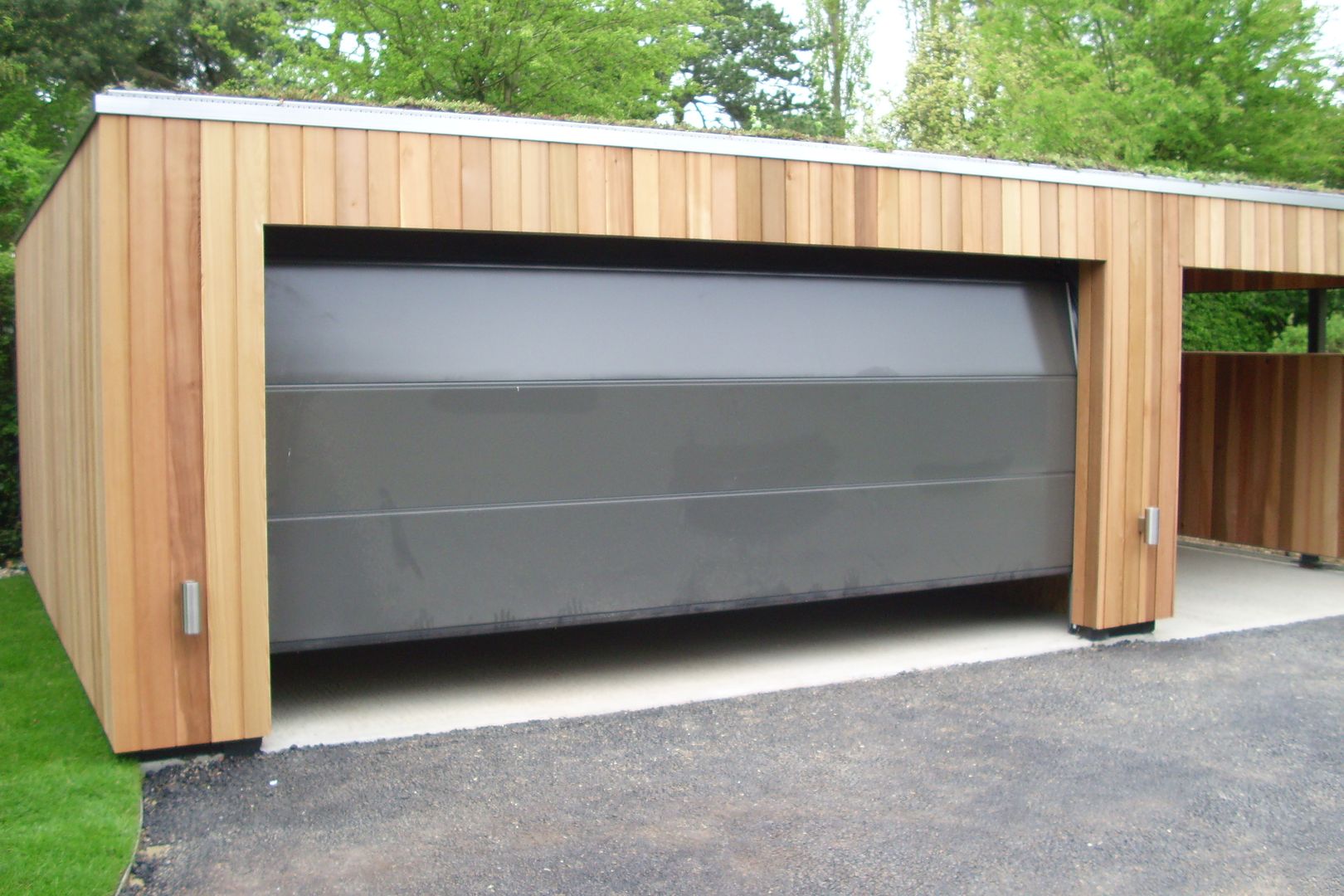 Autospace, ecospace españa ecospace españa Garagens pré-fabricadas Madeira Acabamento em madeira