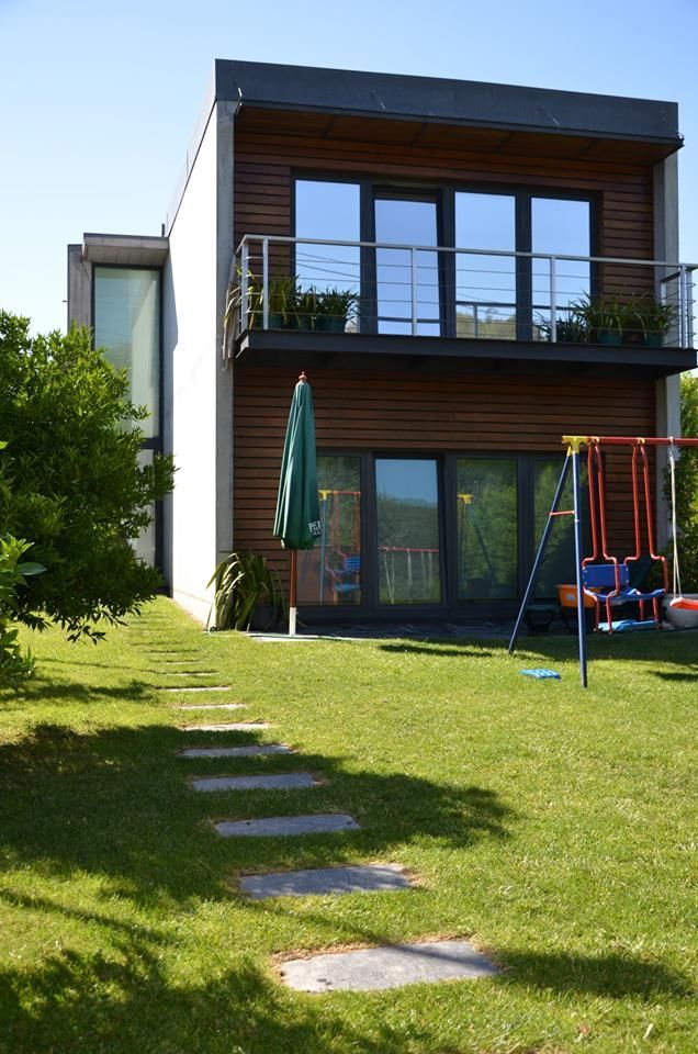 Private house building in Lousada (Portugal), Dynamic444 Dynamic444 Jardines de estilo moderno