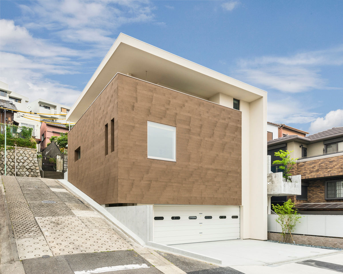 傾斜地に建つ家, Egawa Architectural Studio Egawa Architectural Studio Casas de estilo ecléctico