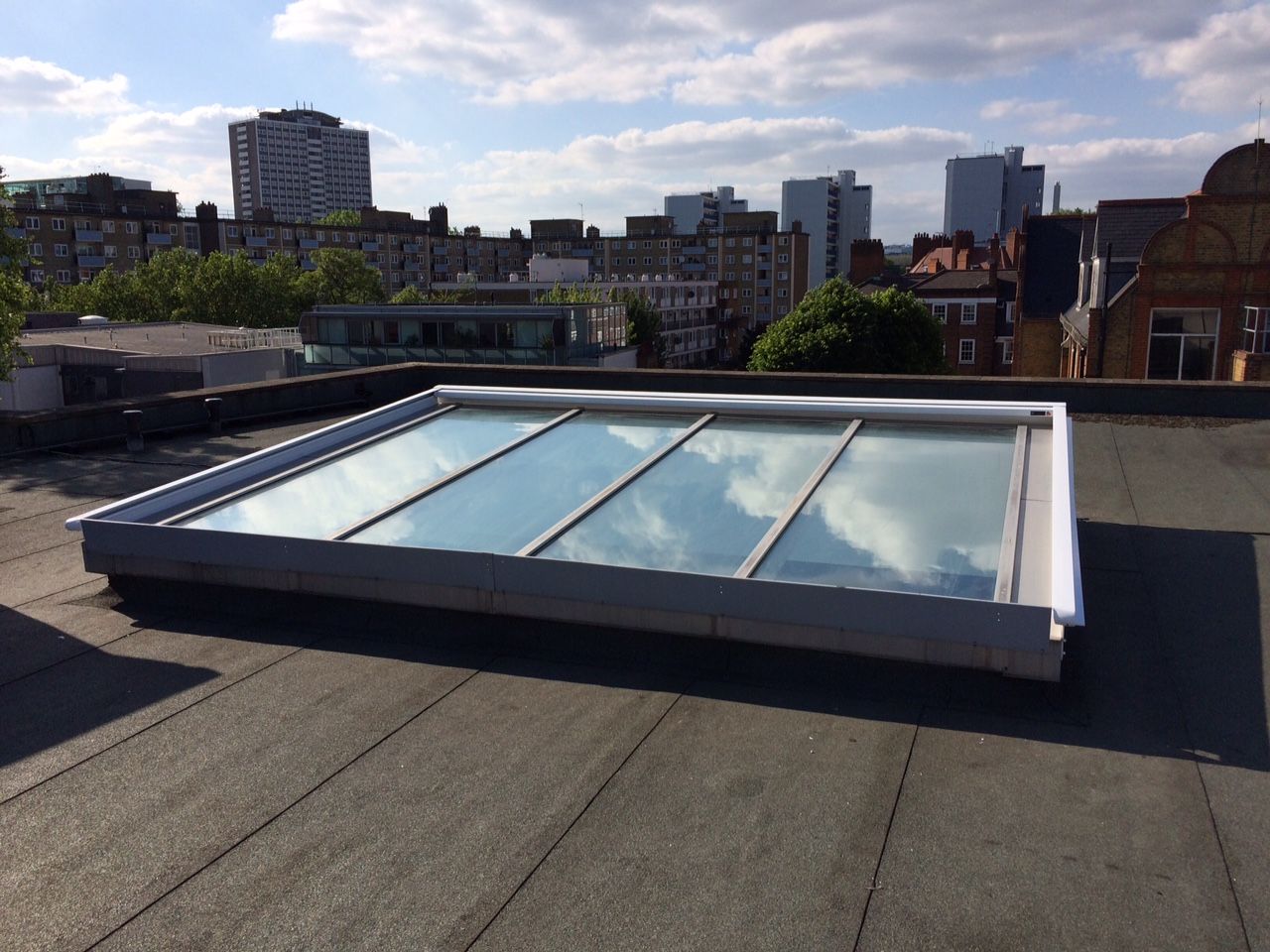 External Roof Blind Installation in Clerkenwell, London homify Pintu & Jendela Modern Blinds & shutters