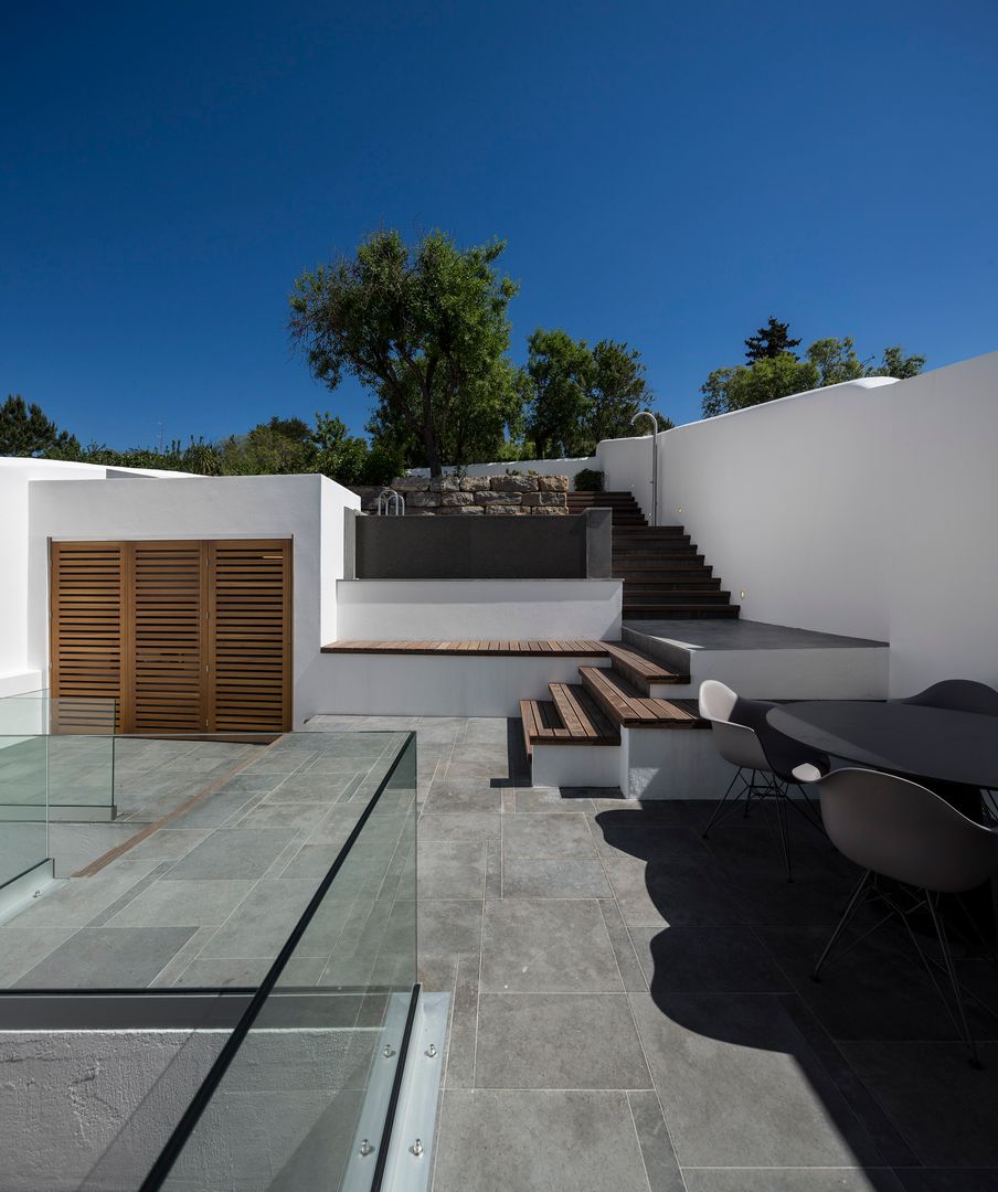 CASA 103, MARLENE ULDSCHMIDT Architects Studio MARLENE ULDSCHMIDT Architects Studio Patios