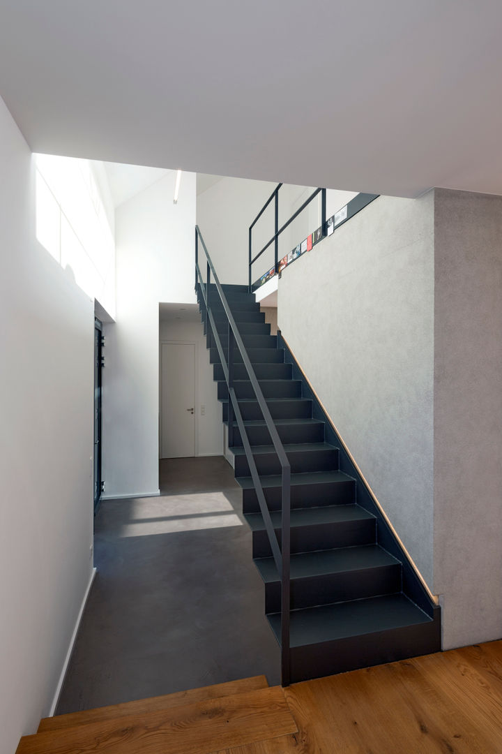 homify Modern corridor, hallway & stairs