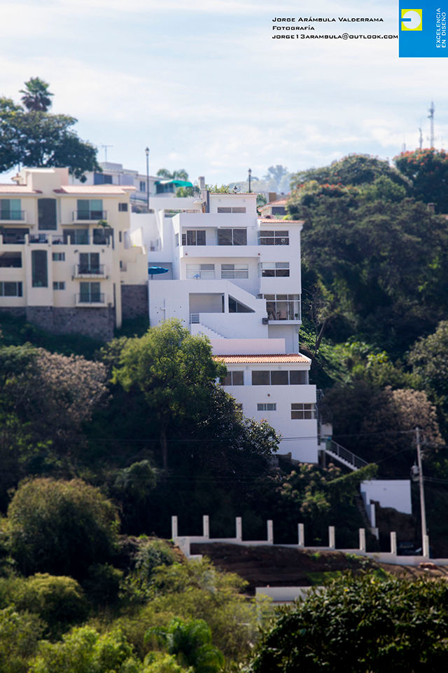 fachada exterior Excelencia en Diseño Casas estilo moderno: ideas, arquitectura e imágenes Concreto