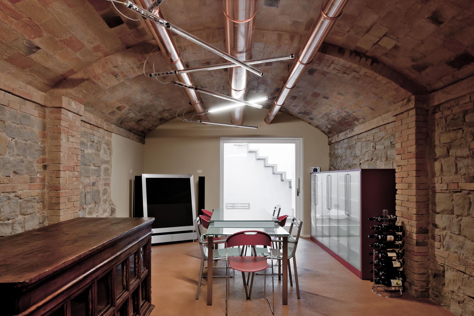 Ristrutturazione casa a schiera primi '900, Studio Olmeda Arch. Marco Amedeo Studio Olmeda Arch. Marco Amedeo Wine cellar