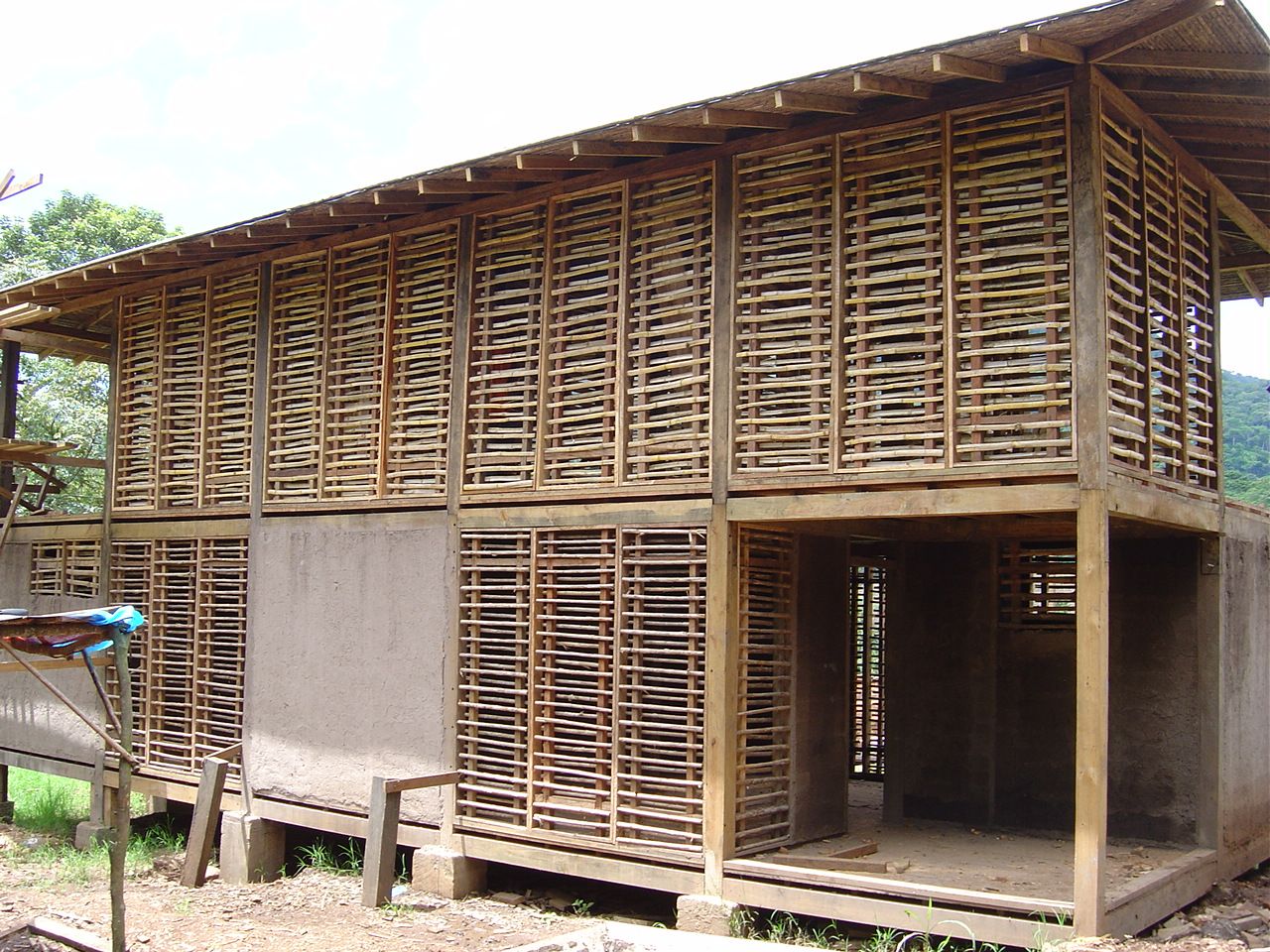 Pueblo Autosuficiente, ABCDEstudio ABCDEstudio Casas de estilo tropical Madera Acabado en madera