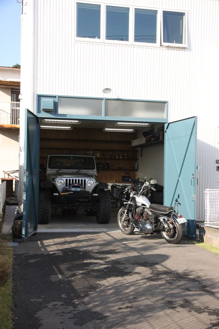 天高3m以上あるガレージがある家, HOUSETRAD CO.,LTD HOUSETRAD CO.,LTD Eclectische garage