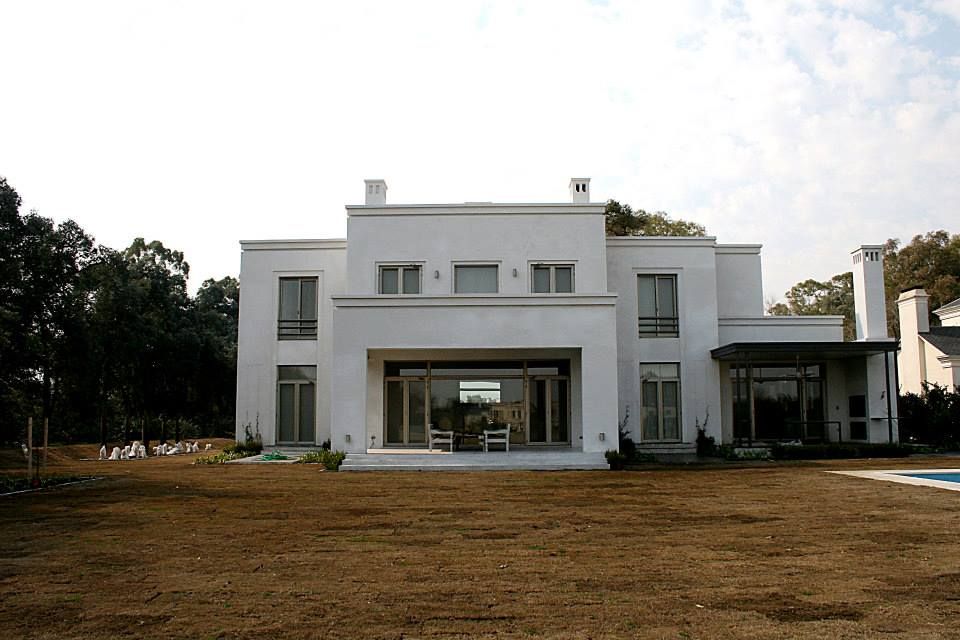 Casa Byrnes, Aulet & Yaregui Arquitectos Aulet & Yaregui Arquitectos Maisons modernes