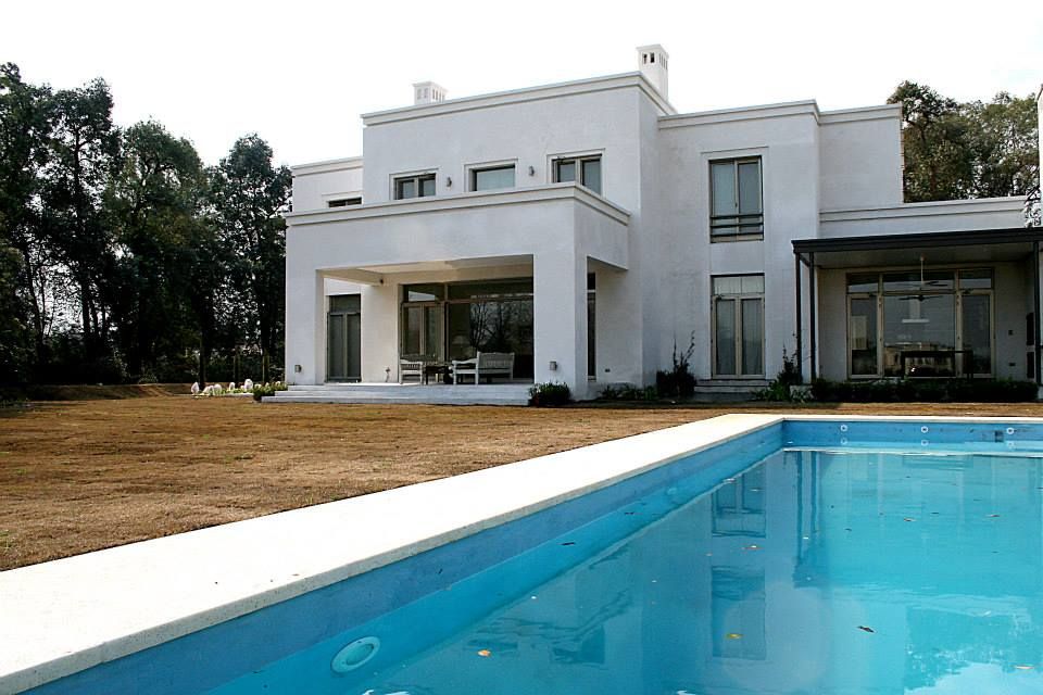 Casa Byrnes, Aulet & Yaregui Arquitectos Aulet & Yaregui Arquitectos Modern pool