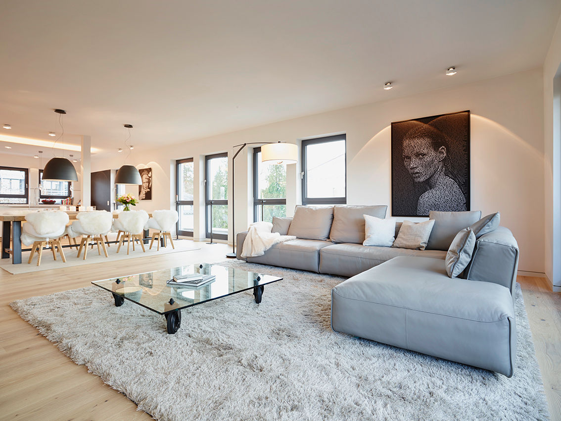 Stylish und gemütlich: ein Penthouse zum Wohlfühlen, HONEYandSPICE innenarchitektur + design HONEYandSPICE innenarchitektur + design Modern living room