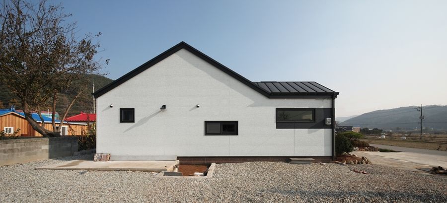 햇살품은 미니멀리즘 주택 [용인 방아리], 윤성하우징 윤성하우징 Дома в стиле модерн