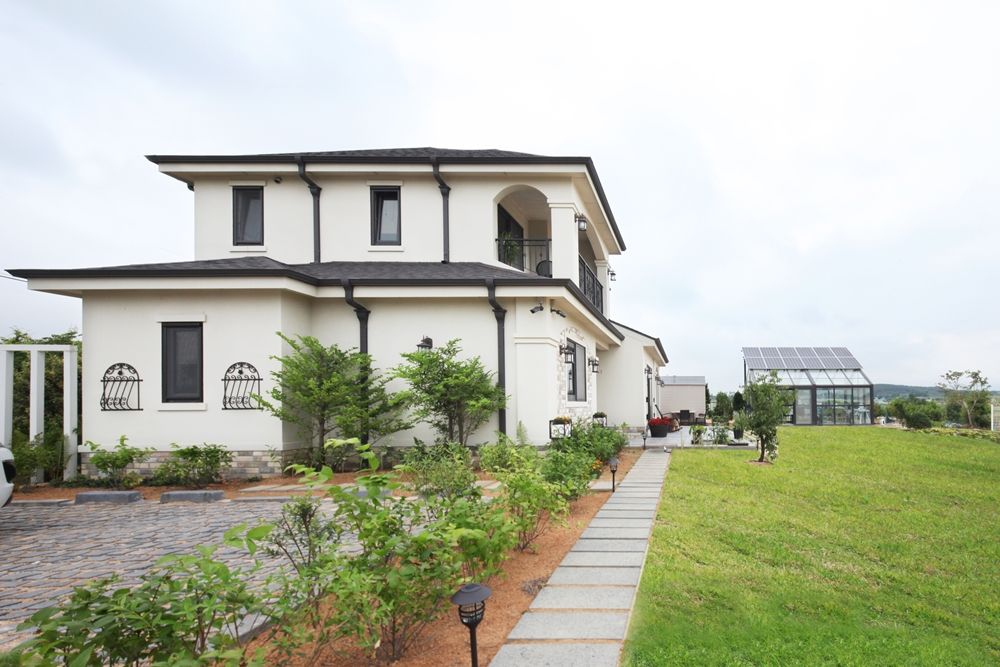 썬룸에서 즐기는 따뜻한 햇살 [서산 부산리], 윤성하우징 윤성하우징 Classic style houses