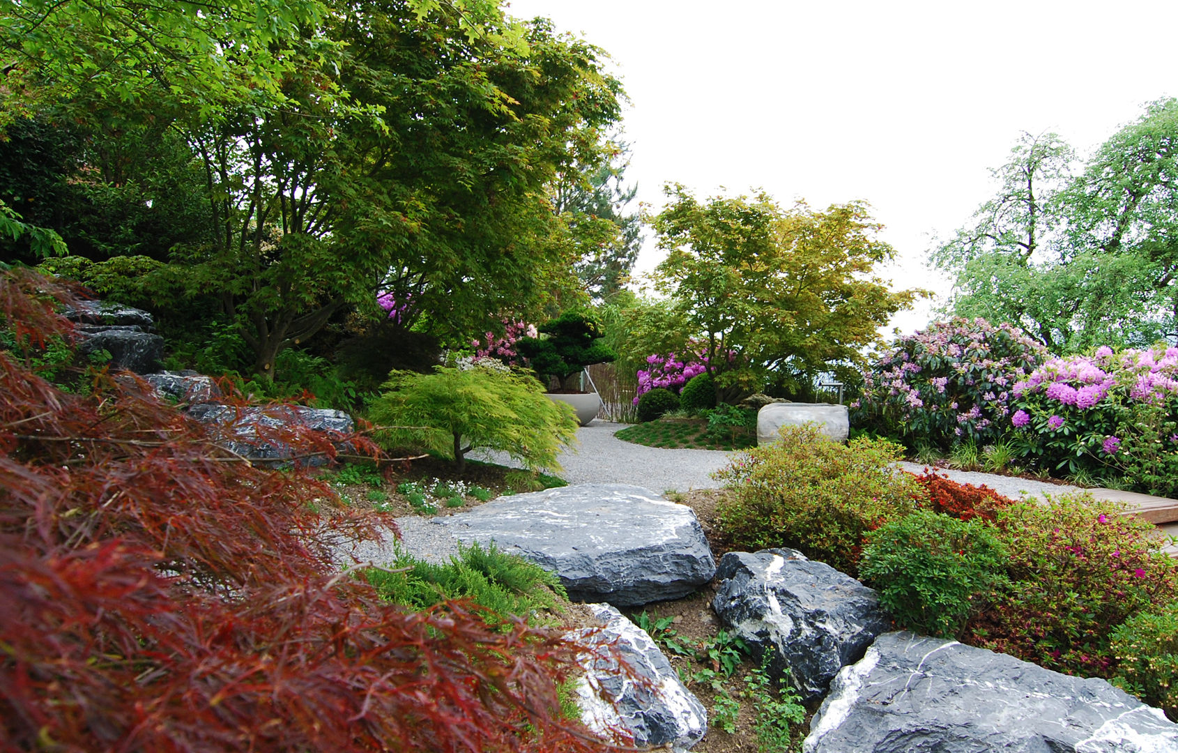 ​Tiefenwirkung durch Öffnung, Lustenberger Schelling Landschaftsarchitektur Lustenberger Schelling Landschaftsarchitektur Asian style gardens