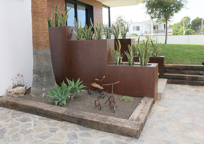 Grao Castellón, tiovivo creativo tiovivo creativo Casas de estilo mediterráneo jardín,jardín frontal,valla de jardín,cactus