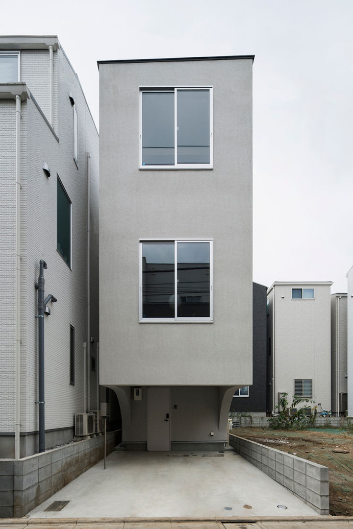 House in Osaki, Kentaro Maeda Architects Kentaro Maeda Architects Casas modernas Concreto