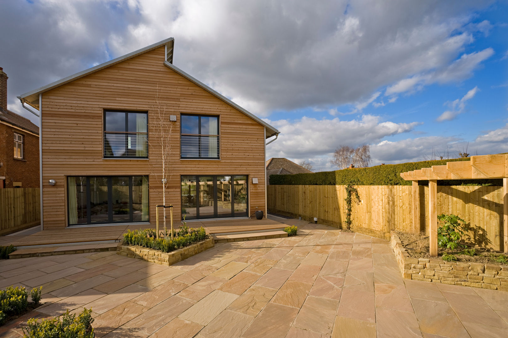 Exteriors Baufritz (UK) Ltd. Casas de estilo moderno