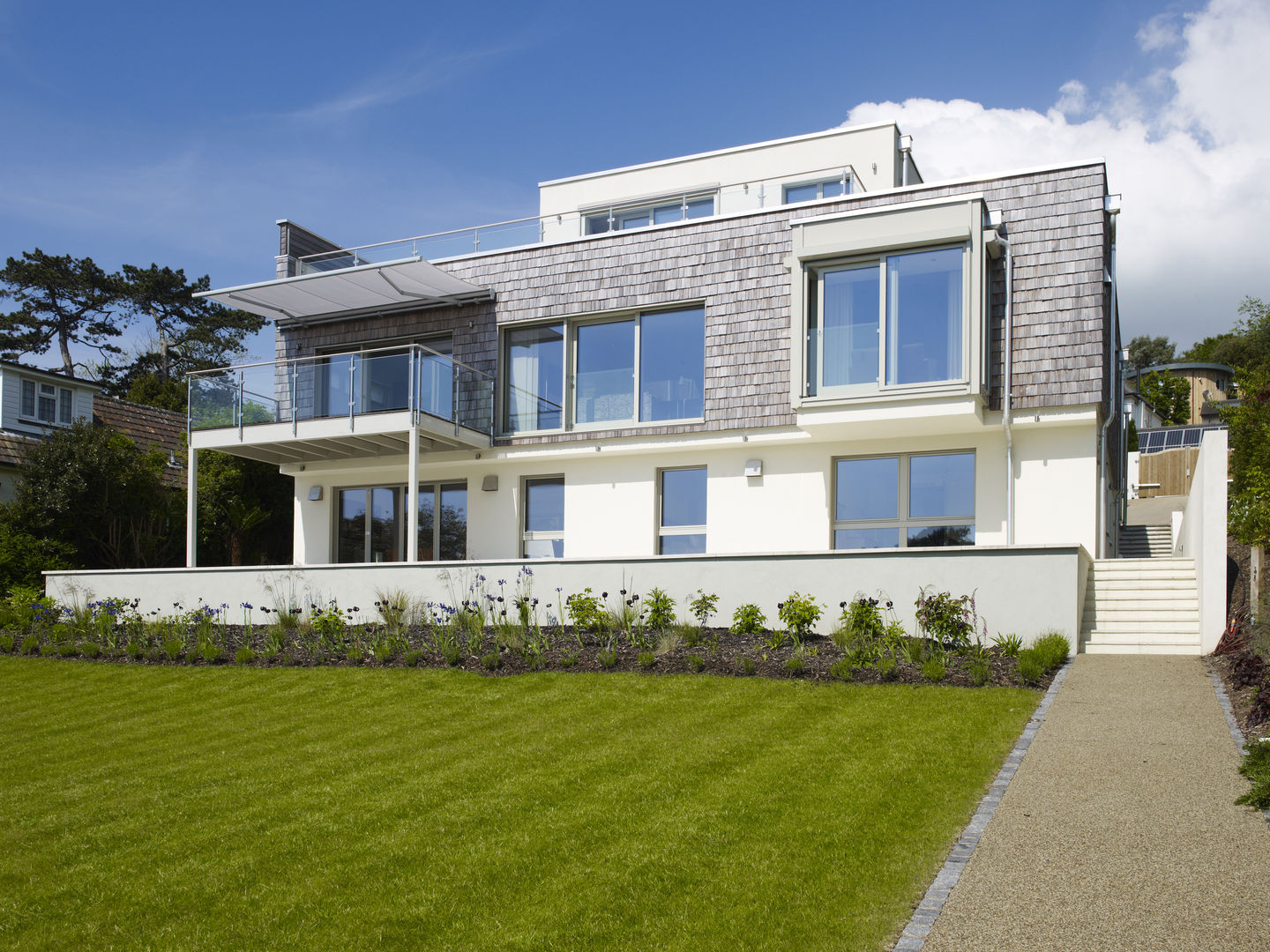 Exteriors Baufritz (UK) Ltd. Casas de estilo moderno