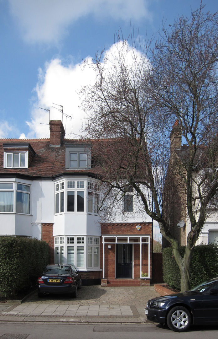 Street facade with new porch homify Terrace Wood Wood effect