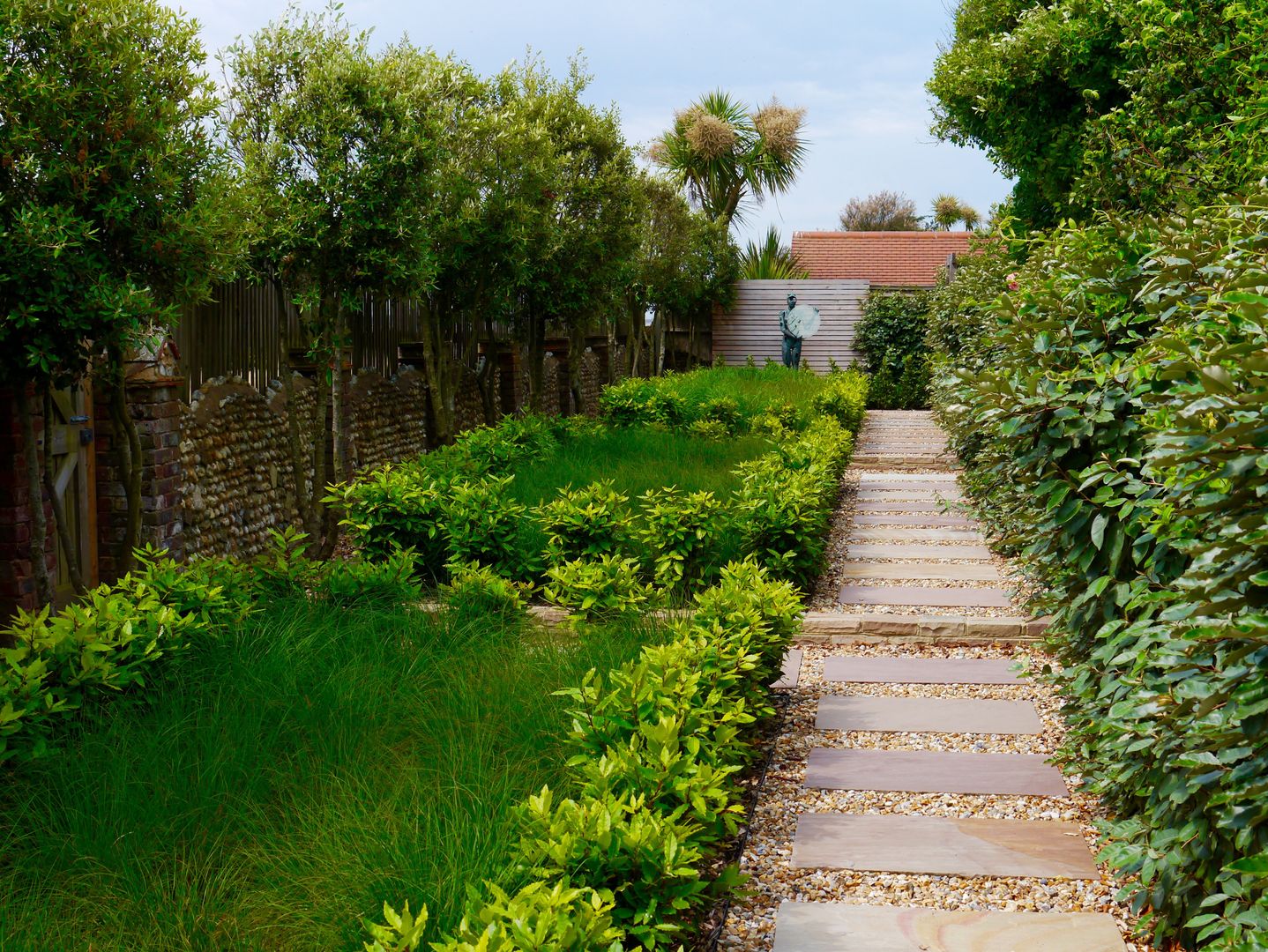 Coastal sculpture garden homify Jardines de estilo moderno