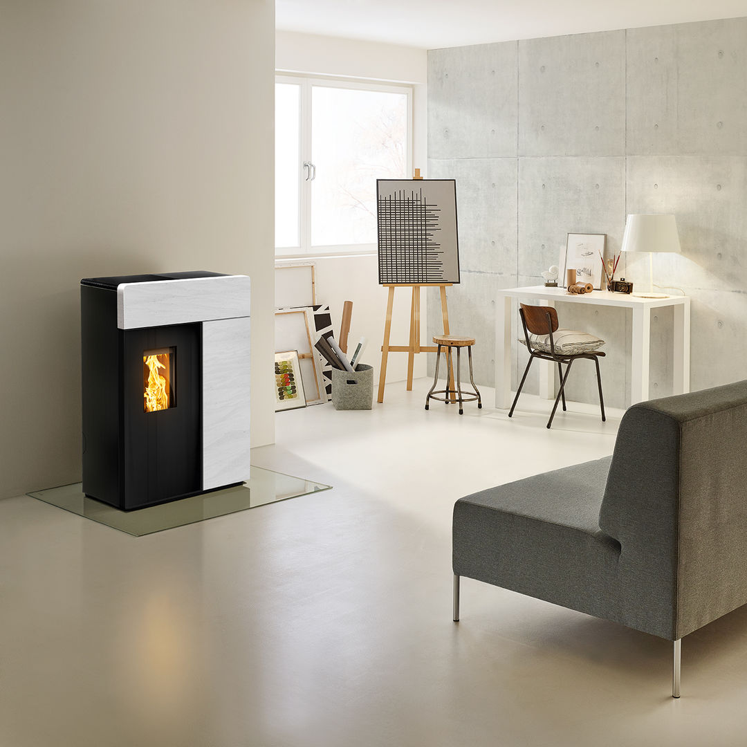 DOMO Pelletofen, RIKA Innovative Ofentechnik GmbH RIKA Innovative Ofentechnik GmbH غرفة المعيشة حجر Fireplaces & accessories