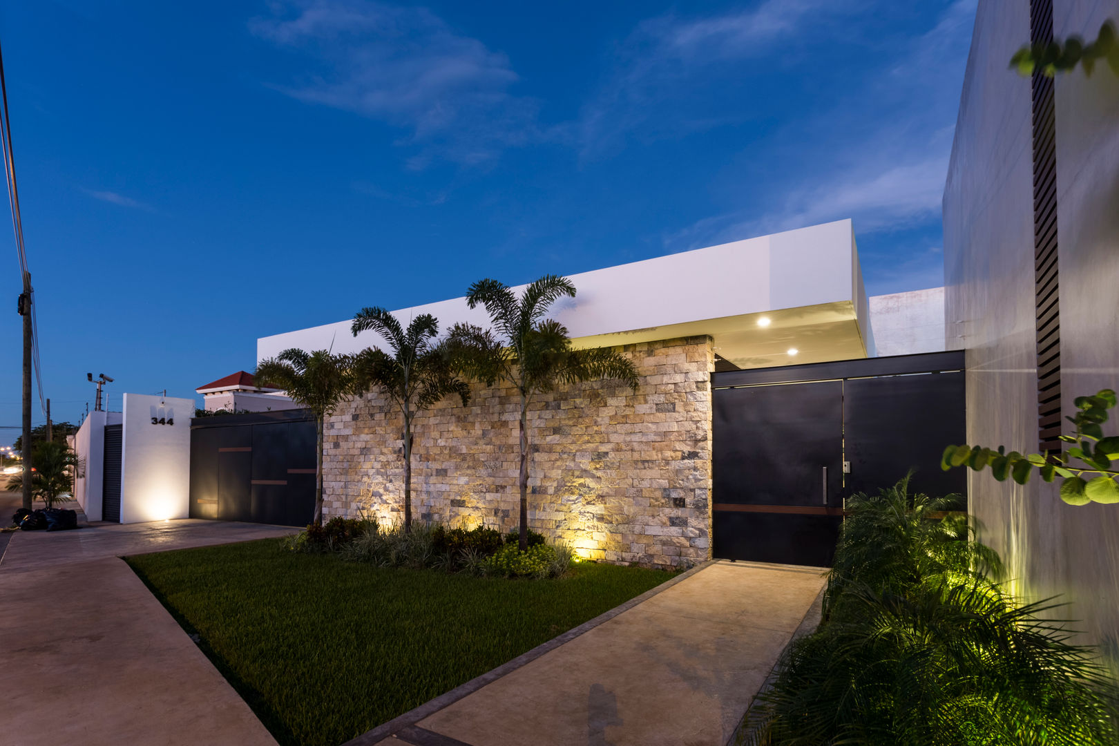 Casa O44, P11 ARQUITECTOS P11 ARQUITECTOS Rumah Modern