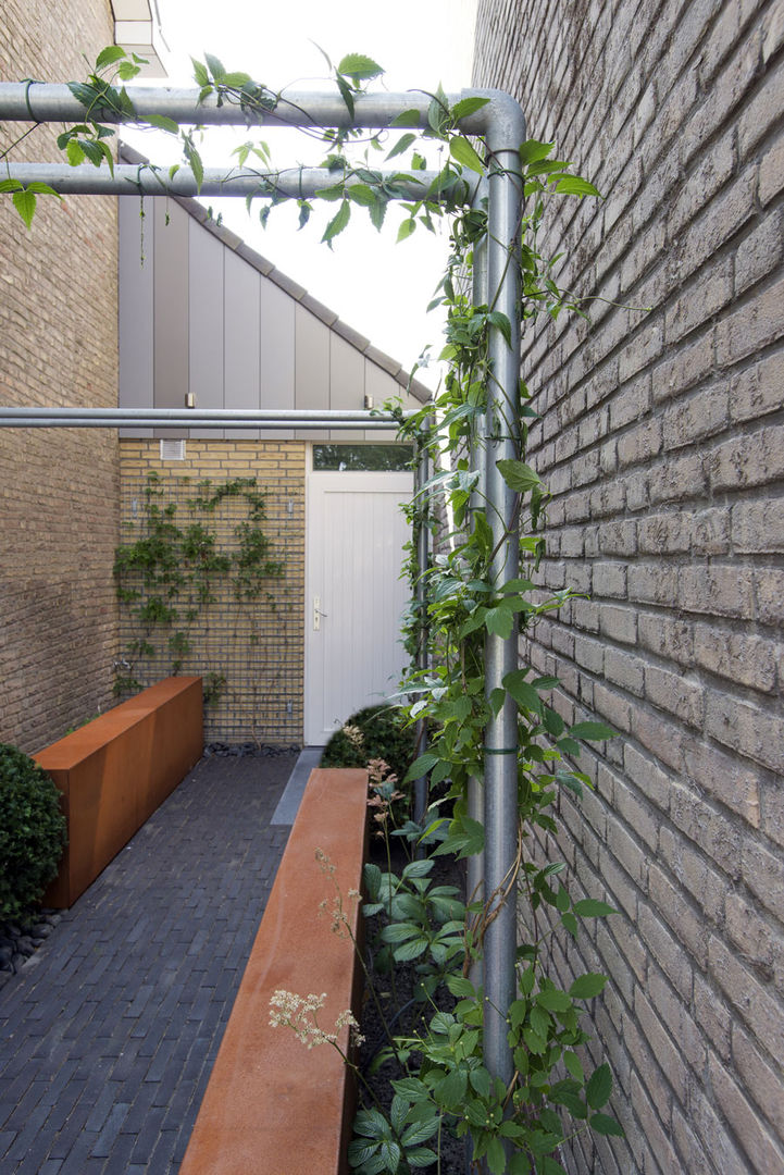 Kleine tuin in Made, De Rooy Hoveniers De Rooy Hoveniers Nowoczesny ogród