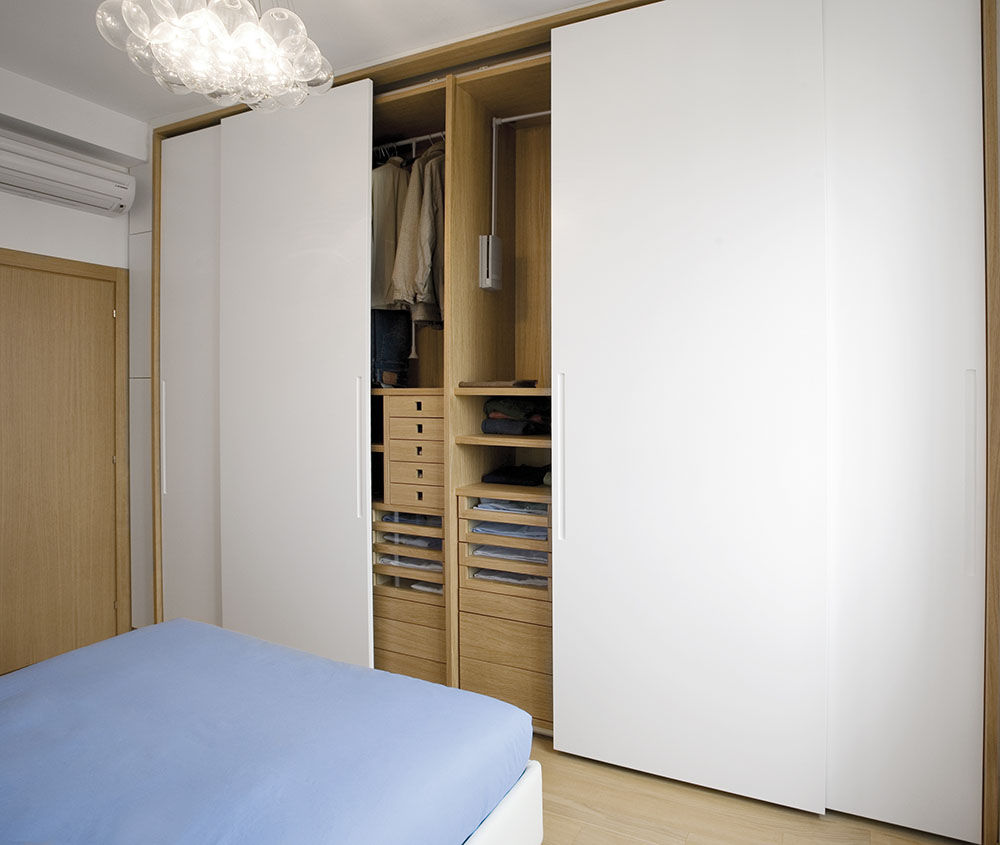 Essenzialmente rovere: 150 sqm Appartmento, PAZdesign PAZdesign Modern style bedroom Wood Wood effect