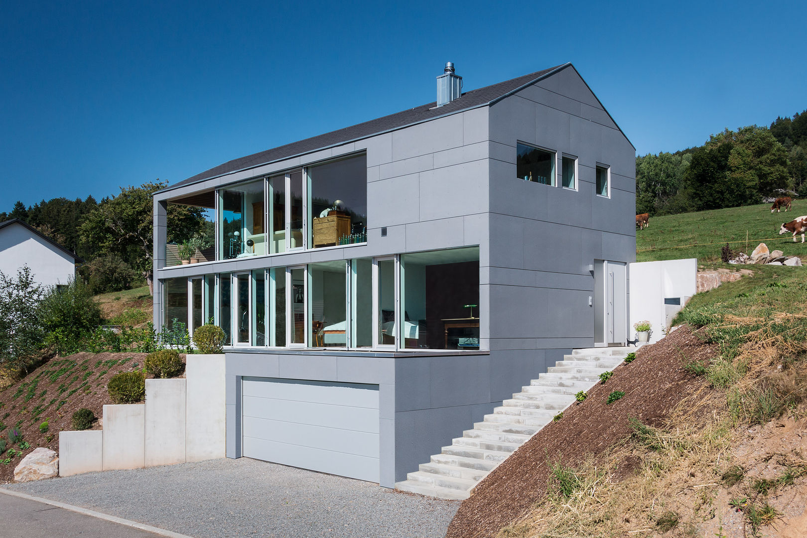 Modernes Energiesparhaus in Elzach, René Lamb Fotodesign GmbH René Lamb Fotodesign GmbH บ้านและที่อยู่อาศัย