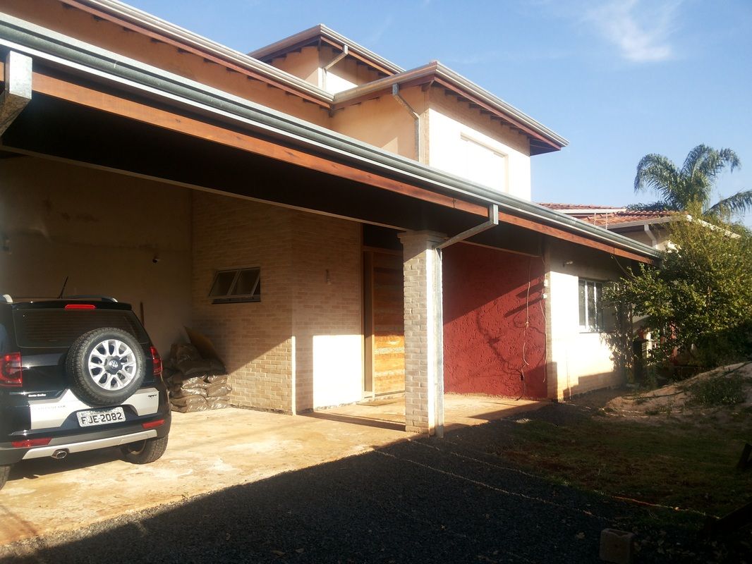 Residência Unifamiliar em Ribeirão Preto, Graziella Corrado Arquitetura Graziella Corrado Arquitetura Garagens e edículas modernas