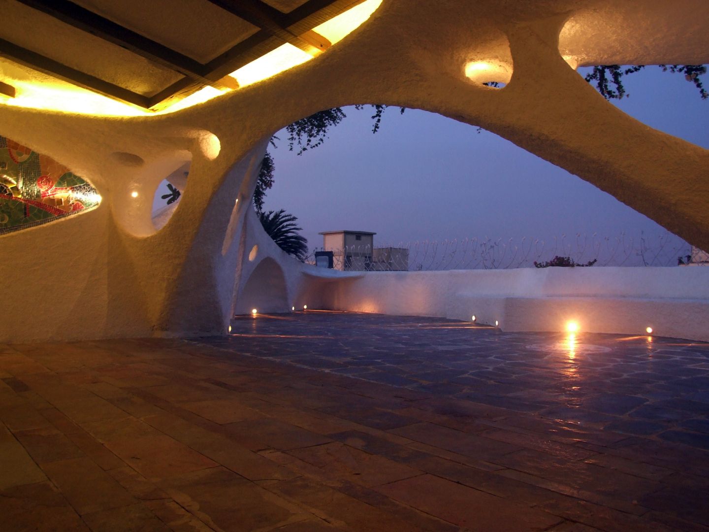 Terrace at night The White Room Mediterranean style garden Concrete