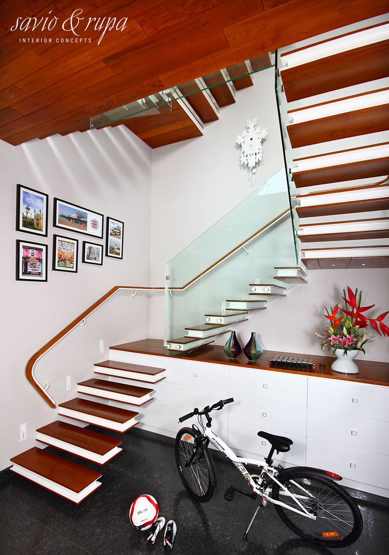 Cantilevered Staircase with Inbuilt Shoe Storage Savio and Rupa Interior Concepts Stairs Stairs